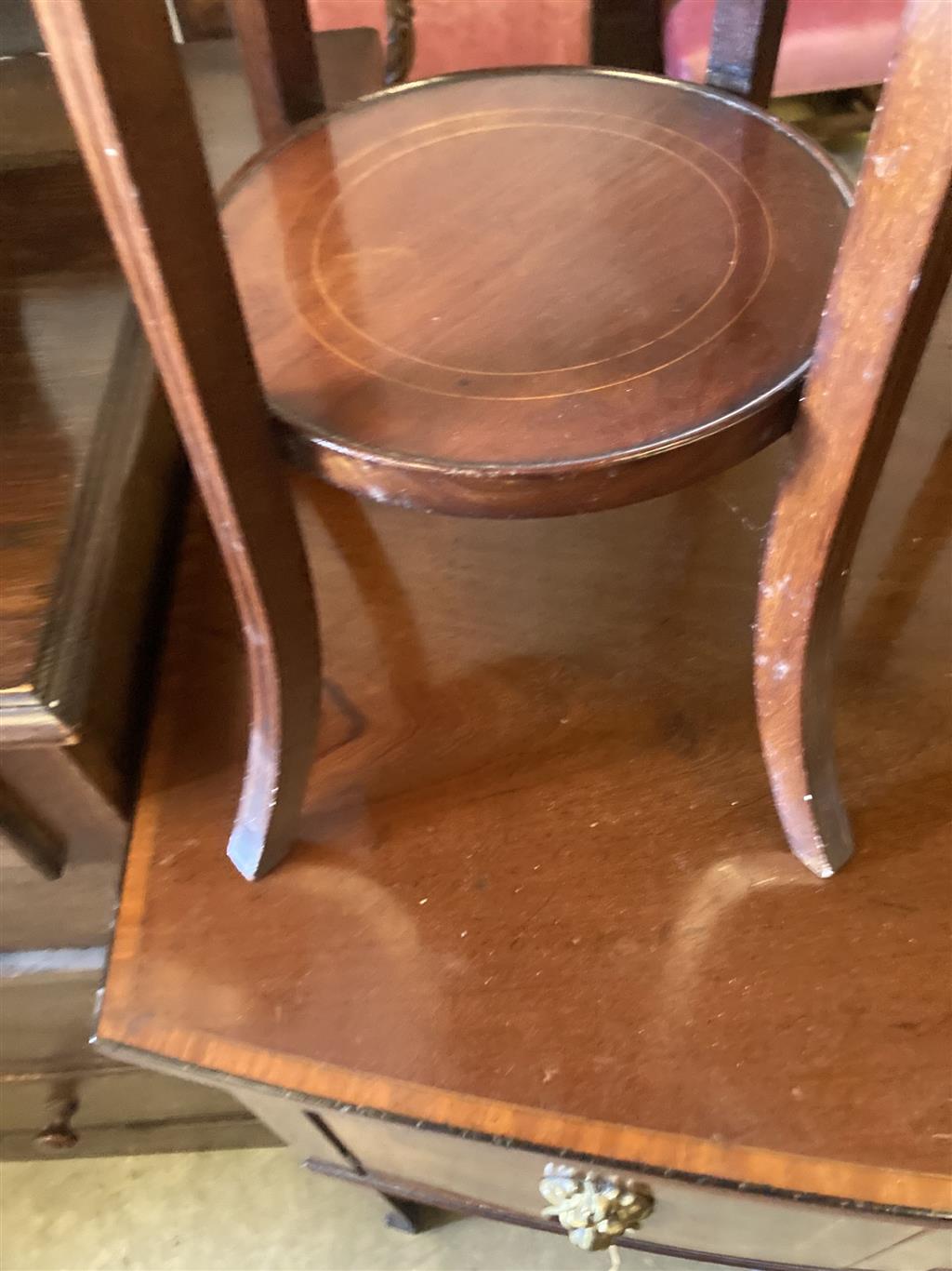 An oval marquetry inlaid mahogany occasional table, width 75cm, depth 52cm, height 50cm, together with an Edwardian two tier plant stan